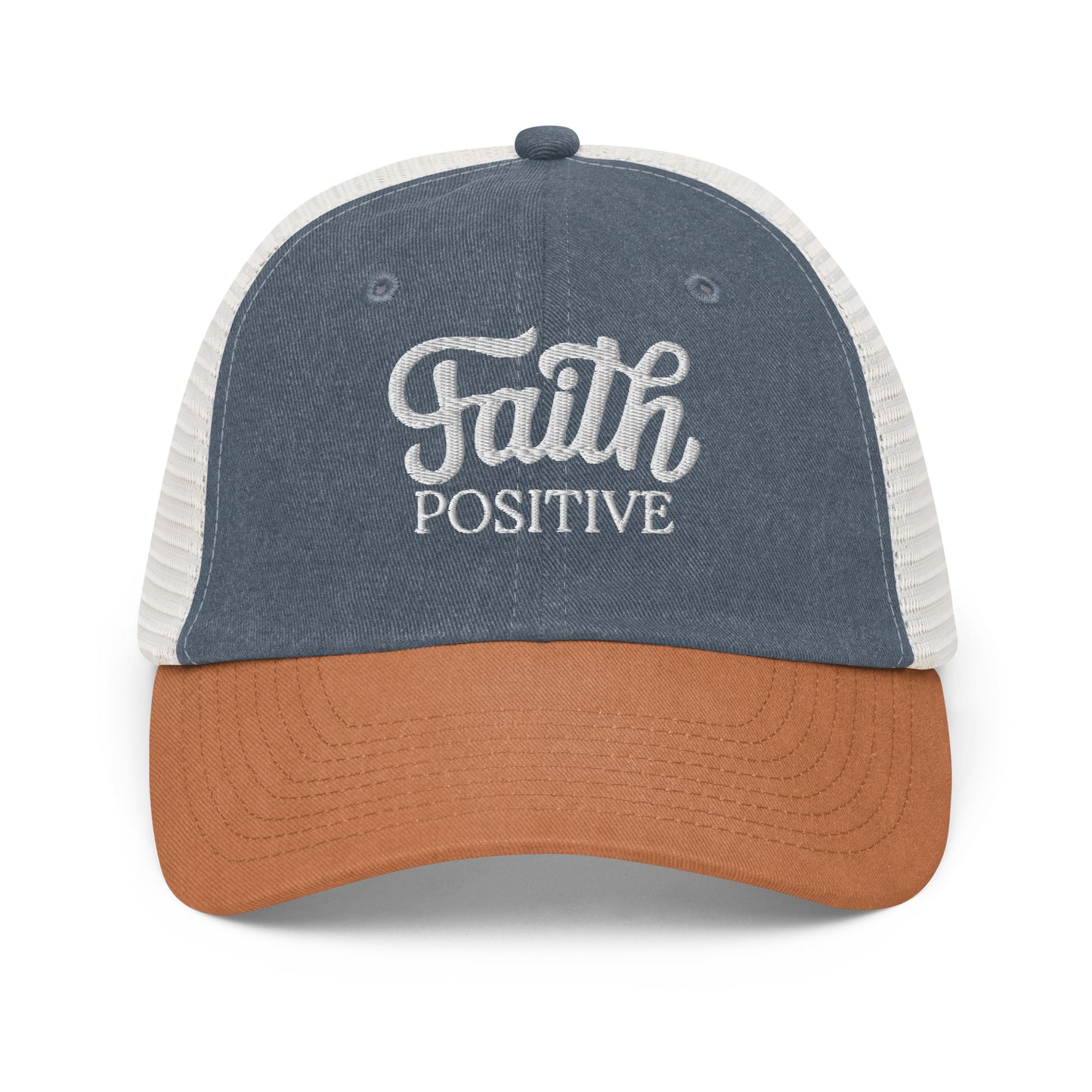 This is the Faith Positive low profile hat. The Faith Positive logo is embroidered on the front with white thread. This hat is pigment dyed, it has a mesh back, blue front and orange bill. Front view of the product.